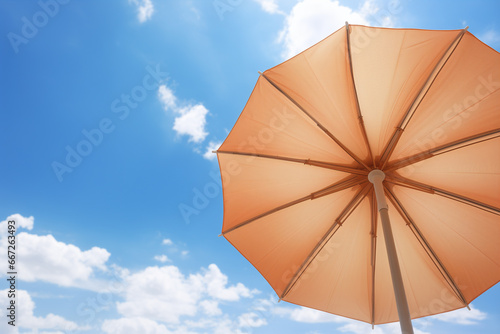 Beach umbrella towards blue sky on a sunny day