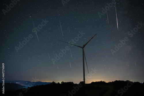 wind turbines in the stary night