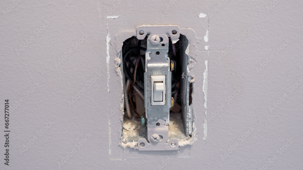 Light switch without cover plates. Light switch without cover plates.