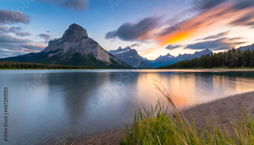scenic sunset over vermilion lake and mount rundle in banff national park alberta canada long exposure photo