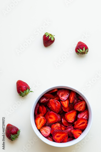 Sliced Strawberries in the bowl background, healthy food