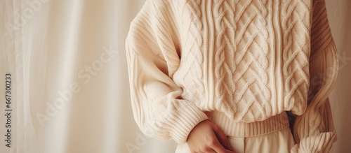 Autumn winter fashion sale Cozy women s knit pullover beige color on white background photo