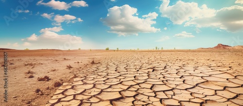 Heat drought and ecological damage caused by man made climate change result in widespread desertification and soil degradation