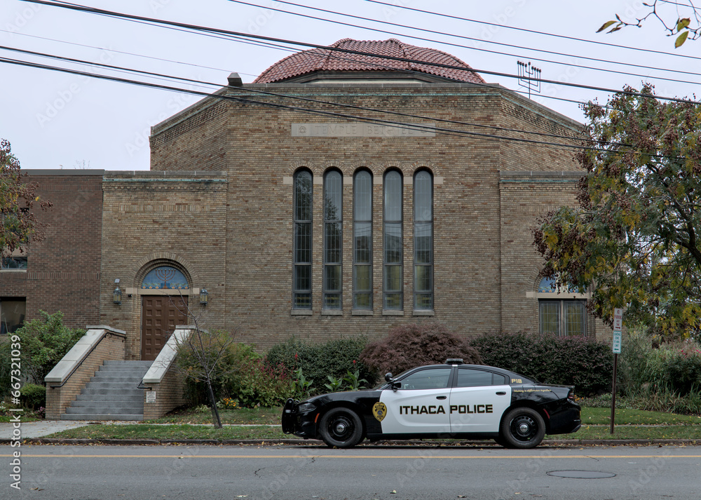 police-cruiser-car-parked-on-in-front-of-jewish-temple-beth-el-in