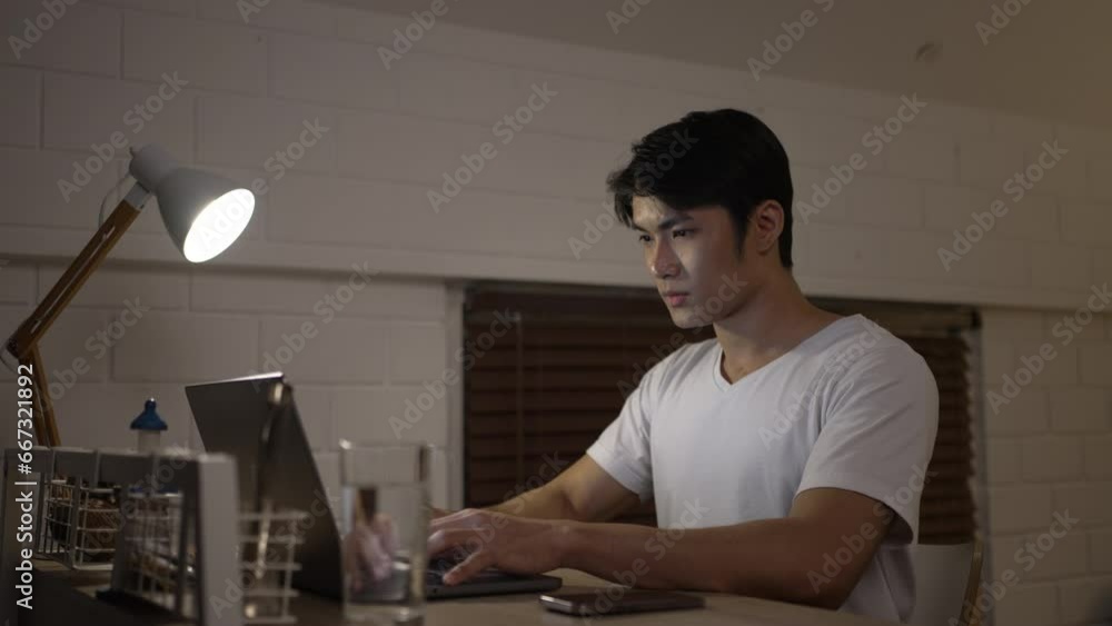 A man is working late at night. Working at night concept. A man is working late at night. Working at night concept.