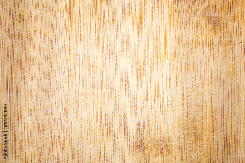 Fototapeta premium Texture of scratched wood, boards. Background of old wooden cutting board.