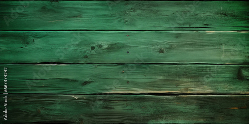 Textura de unos tablones de madera pintados de color verde, desgastados