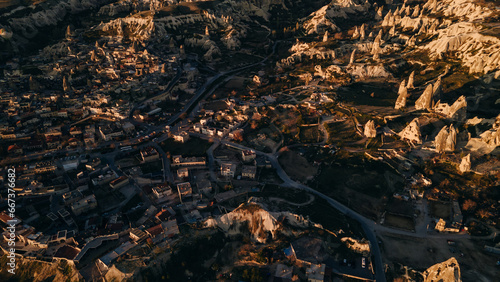 Goreme, Cappadocia, Turkey. View of the evening city from from drone