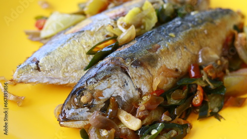 Grilled mackerel with dabu chili sauce. photo