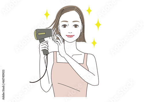 ドライヤーで髪の毛がツヤツヤになって笑顔の女性