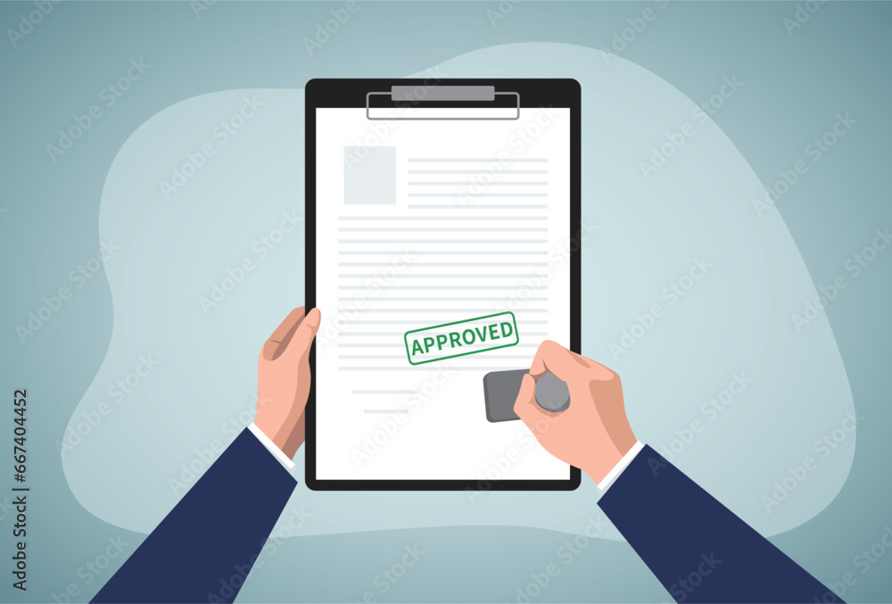 Approved document with stamp.Hand holding a stamp. Approved document with stamp.Hand holding a stamp.