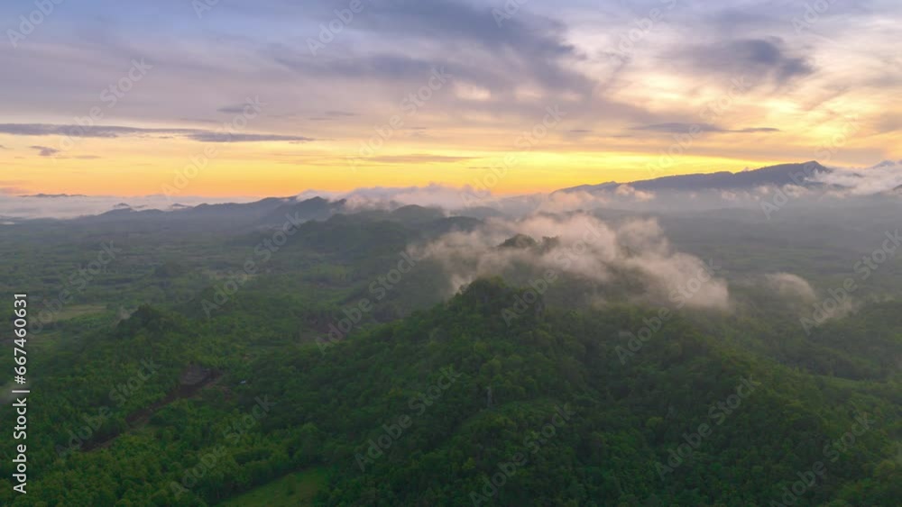 Hyperlapse 4K, The weather is hot and humid, with a lot of water vapor creating a sea of mist in the foreground in the valley of Ban Pang Puai, Mae Mo, Lampang, Thailand. Hyperlapse 4K, The weather is hot and humid, with a lot of water vapor creating a sea of mist in the foreground in the valley of Ban Pang Puai, Mae Mo, Lampang, Thailand.