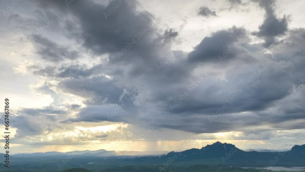 Video: Hyperlapse 4K, Rainstorms and black clouds are moving over the mountains in the north of Thailand, in Mae Moh district, Lampang. Video: Hyperlapse 4K, Rainstorms and black clouds are moving over the mountains in the north of Thailand, in Mae Moh district, Lampang.