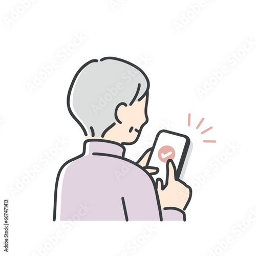 スマホを操作するシニア女性