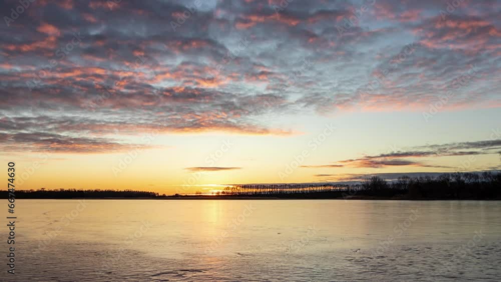 Peaceful Timelapse of Clouds and Sunset With a Peaceful Lake in the Foreground Peaceful Timelapse of Clouds and Sunset With a Peaceful Lake in the Foreground