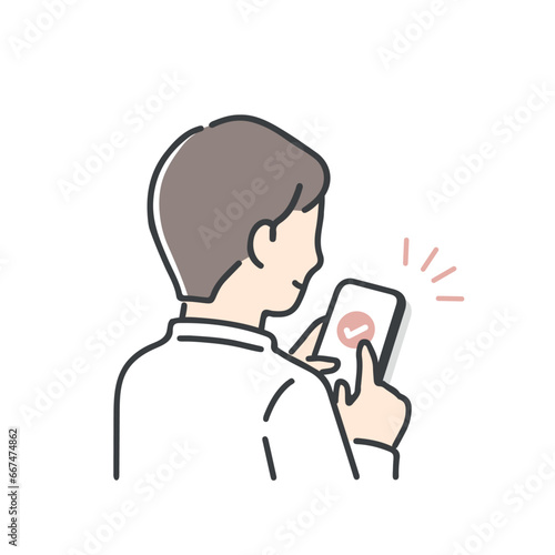 スマホを操作する若い男性
