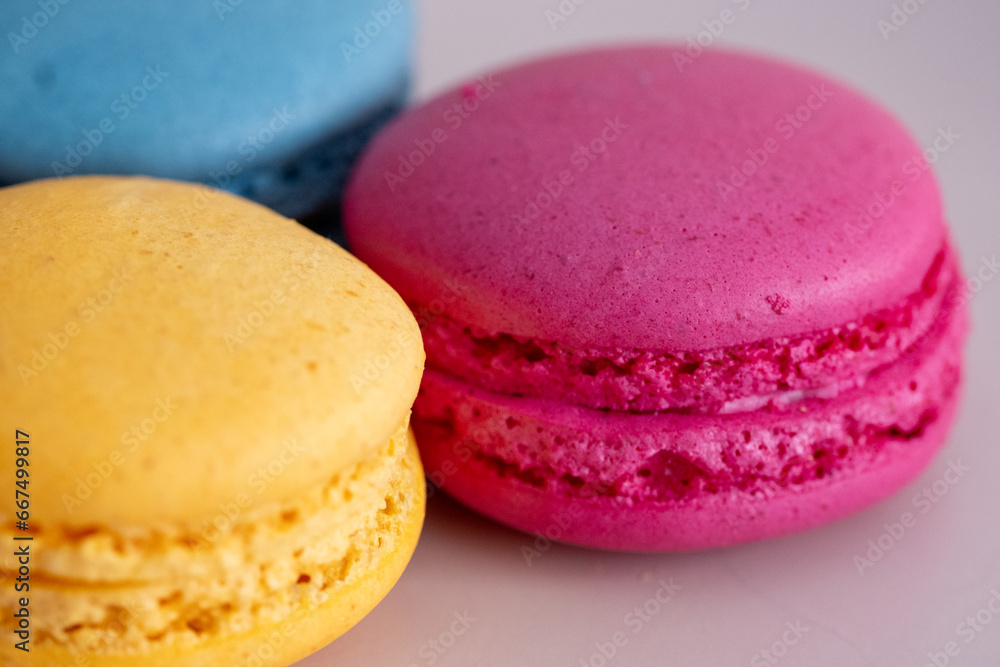 colorful macaroons on a plate colorful macaroons on a plate