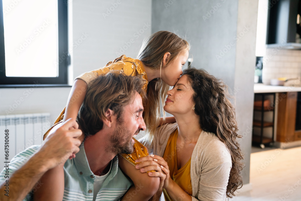 Happy family having fun time at home. Parents child love concept. Happy family having fun time at home. Parents child love concept.