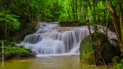 Erawan Waterfall Thailand, a beautiful deep forest waterfall in Thailand. Erawan Waterfall in National Park. green forest with waterfalls