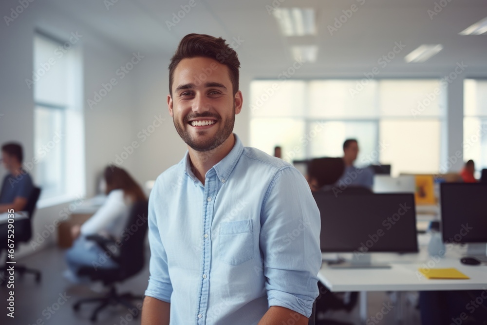 Fototapeta premium Man Standing in Blue Shirt in Office