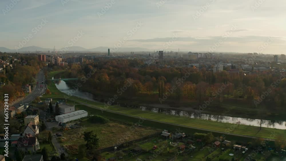 Aerial drone shot of a czech big city Ostrava with buldings, cars, roads, apartments, power plant and towers during autumn fall day Aerial drone shot of a czech big city Ostrava with buldings, cars, roads, apartments, power plant and towers during autumn fall day