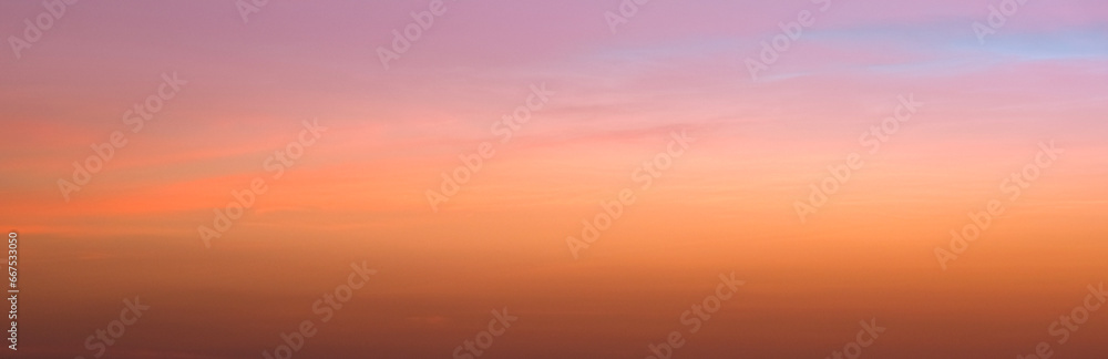 Panoramic views of the skyline and mountains. The sun rises in the morning sky with colorful clouds. and beautiful cloud patterns In the soft light of the morning Panoramic views of the skyline and mountains. The sun rises in the morning sky with colorful clouds. and beautiful cloud patterns In the soft light of the morning
