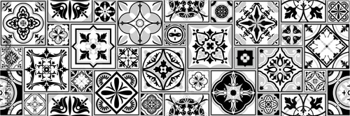 Set of Azulejos tiles in black, white. Original traditional Portuguese and Spanish decor. Seamless patchwork with Victorian motifs. Talavera style ceramic tiles. Mosaic by Gaudi. Vector photo