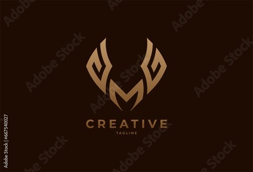 initials GMG or MG logo. monogram logo design combination of letters M and G in gold color. usable for brand and business logos. flat design logo template element. vector illustration