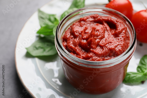 Wallpaper Mural Jar of tasty tomato paste on table, closeup Torontodigital.ca