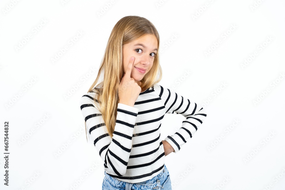 MODEL Pointing to the eye watching you gesture, suspicious expression. MODEL Pointing to the eye watching you gesture, suspicious expression.