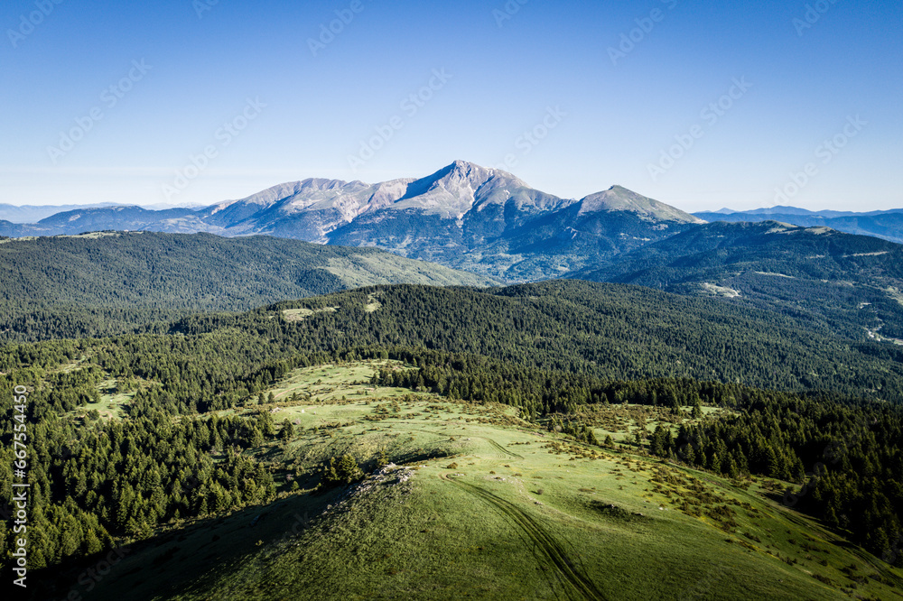 Aerial view of a mountain landscape near Karpenisi town in Greece. Aerial view of a mountain landscape near Karpenisi town in Greece.