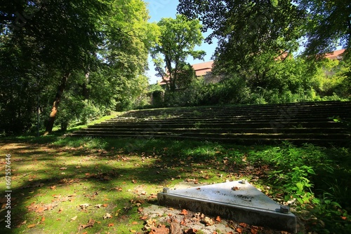 Desolate concrete rows of former open air theatre in Wanzleben, Germany photo