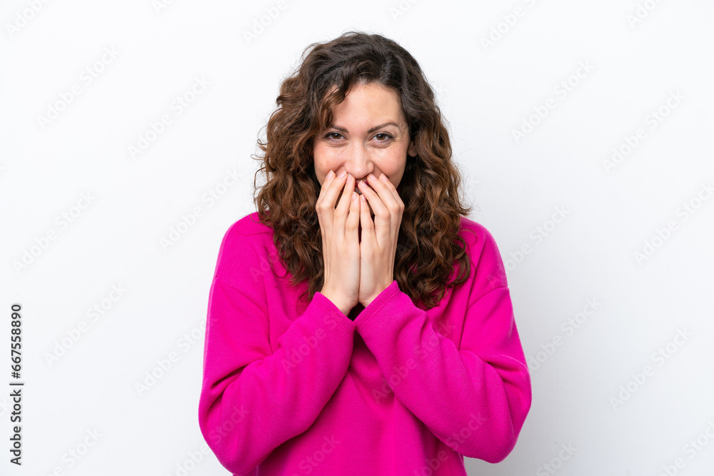 Young caucasian woman isolated on white background happy and smiling covering mouth with hands Young caucasian woman isolated on white background happy and smiling covering mouth with hands