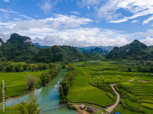 Aerial landscape in Quay Son river  Trung Khanh  Cao Bang  Vietnam with nature  green rice fields and rustic indigenous houses