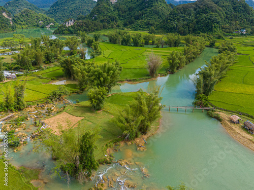 Aerial landscape in Quay Son river  Trung Khanh  Cao Bang  Vietnam with nature  green rice fields and rustic indigenous houses