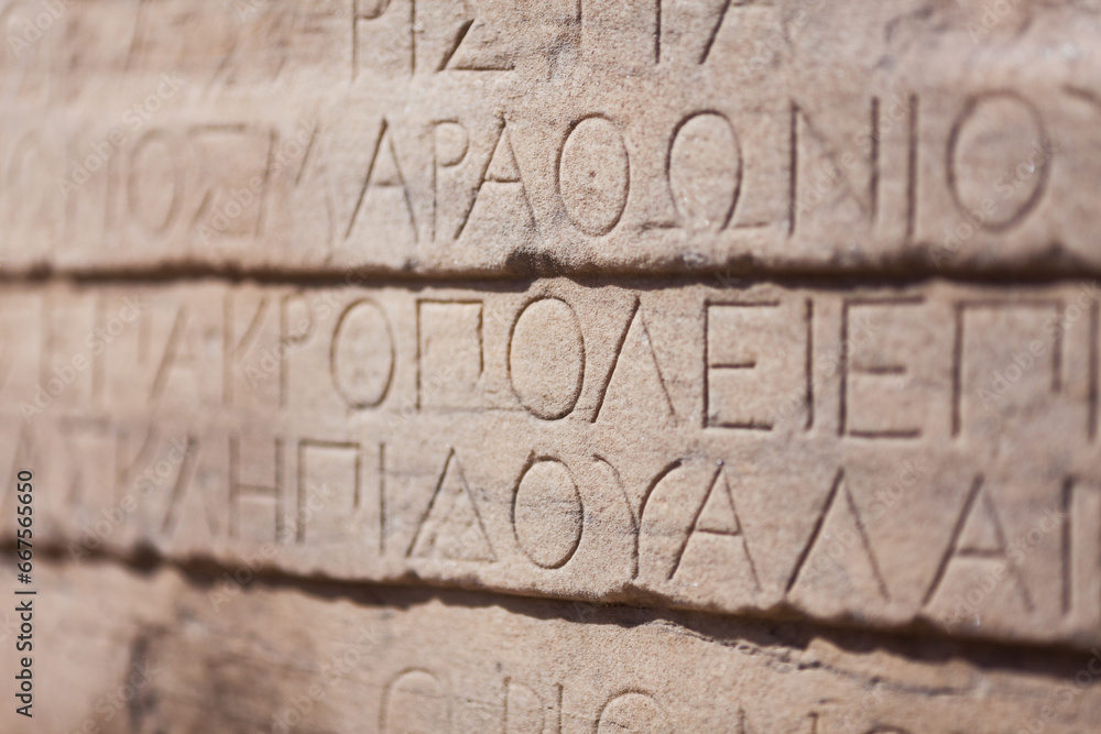 Obraz na płótnie Detail of ancient greek lettering on ruins w salonie