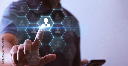 Businessman's hand pressing icon on employment network, system concept, recruitment, hiring people, communication, social network. selection of people
