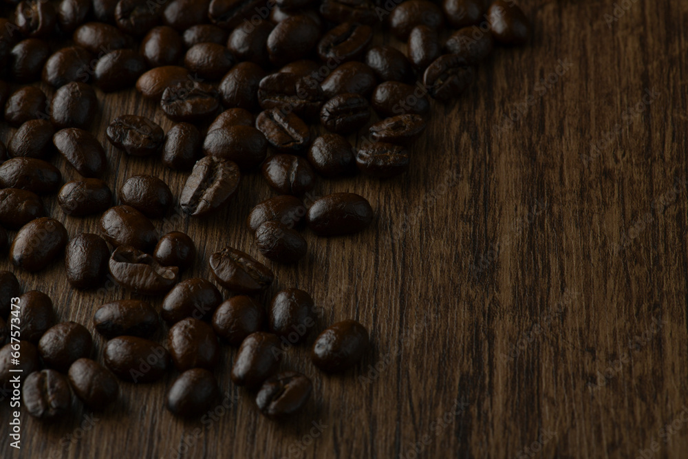 Roasted coffee bean on wooden table. Roasted coffee bean on wooden table.
