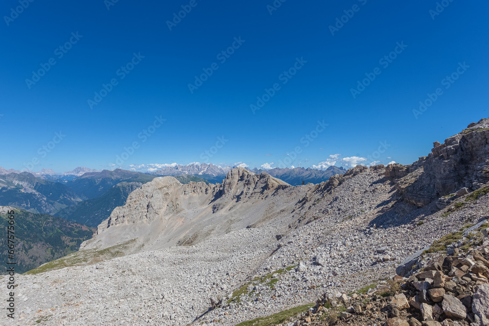 Awesome summer panorama of the southern side of the Latemar Massif with big rocky plateau. UNESCO world heritage site, Trentino-Alto Adige, Italy, Europe