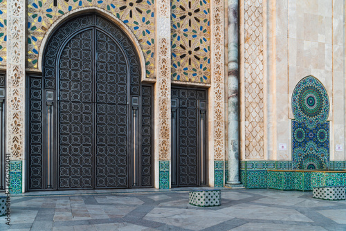 view of Hassan II mosque's big gate full of beautiful moroccan mosaic pattern, Detail of Hassan 2 Mosque in Casablanca, Morocco
