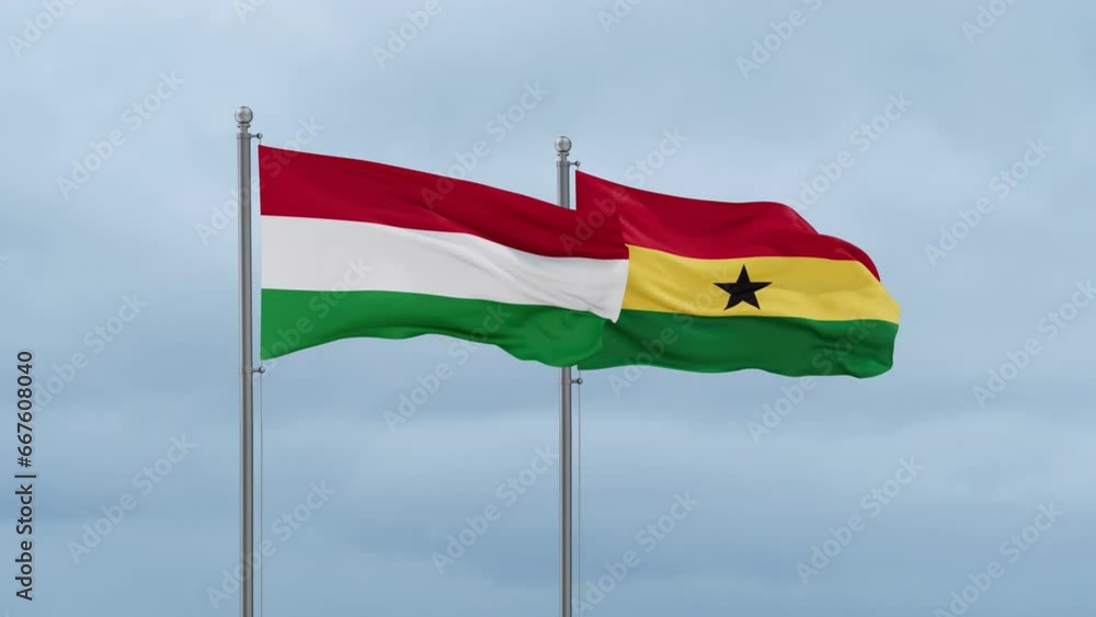 Ghana flag and Hungary flag waving together on cloudy sky, endless seamless loop, two country relations concept Ghana flag and Hungary flag waving together on cloudy sky, endless seamless loop, two country relations concept