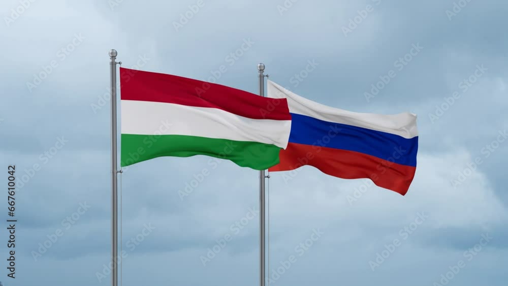 Russian Federation and Hungary flag waving together on cloudy sky, endless seamless loop Russian Federation and Hungary flag waving together on cloudy sky, endless seamless loop