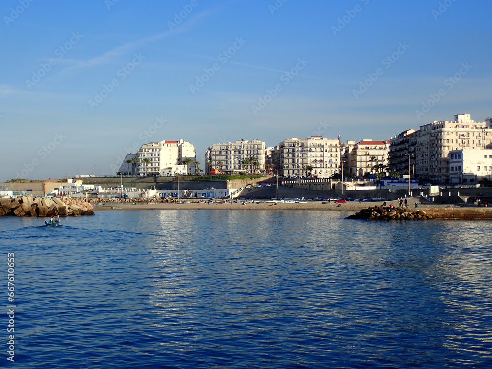 Alger the capital city of Algeria, North Africa, city centre of Algiers, the capital of Algeria, Landscape of Algiers city With port and mediterranean sea and white buildings, Arab Maghreb Africa.