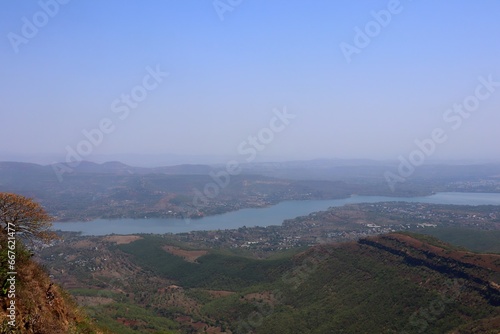 A Glimpse of History: Sinhagad Fort Hills with Khadakwasla Dam Backdrop photo