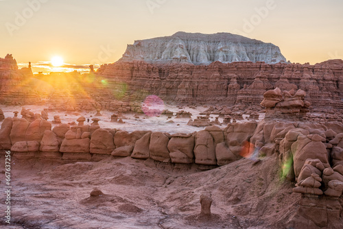 Sandstone desert formations in Goblin Valley State Park Utah. High quality photo taken on a bright day with blue sky photo