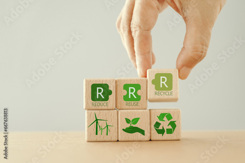 Quadro em tela hand arranged wooden cube block , reduce, reuse and recycle  text  and green ico