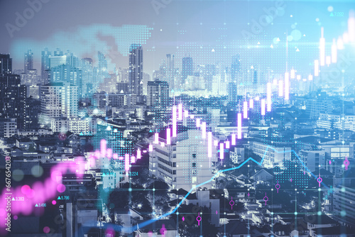 Toned image with glowing candlestick forex chart on blurry city wallpaper. Trade, finance and growing market concept. Double exposure.