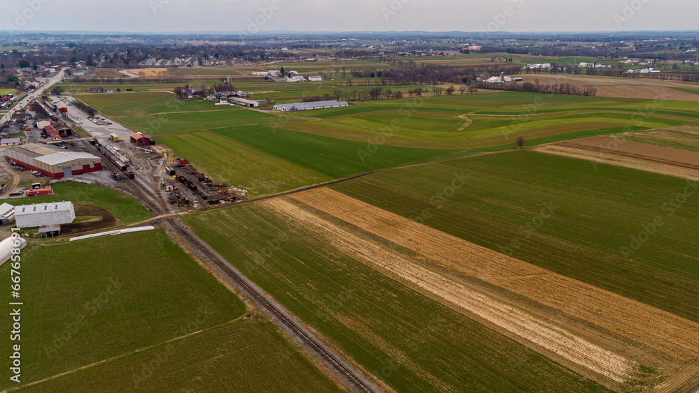 A Drone Landscape of Amish Countryside With Farmland, Farms and Rolling Hills on a Winter Day