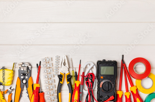 Foto Electrician tools on background