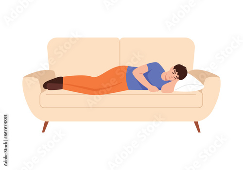 The boy sleeps sweetly or relaxes on the sofa